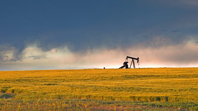 A,Pumpjack,Silhoutte,With,Dramatic,Sunset.
